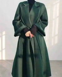 A belted wool-blend wrap coat with lapel collar, adjustable belt, loose fit and long sleeves, designed for a cozy winter layering look that pairs from sneakers to boots.