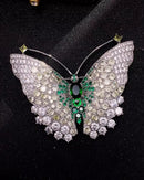 Exquisite baroque butterfly brooch in gold tone, ornate metal pin with intricate wing details and pearl accents, perfect for vintage elegance.