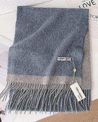 Two-tone wool scarf with contrasting shades, gently brushed surface and fringe ends, a long rectangular 100% wool fall-winter scarf for wrapping at the neck or draping over coats.