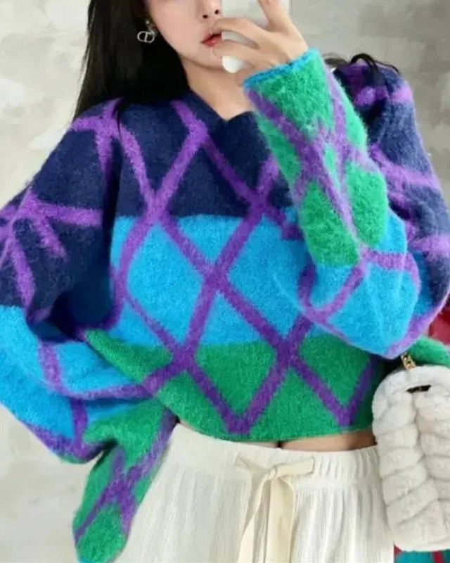 Geometric knit sweater — vintage-inspired jacquard pattern, relaxed round neck, thick acrylic blend. Effortless winter style for everyday wear.