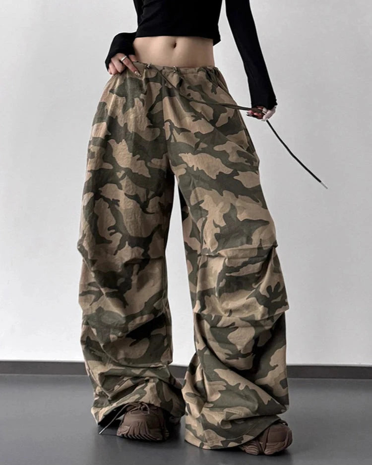 Built for streetwear ease, this high waisted pant balances a relaxed wide leg with structured detailing at the front and hem.