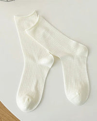 These thin-knit crew socks bring a quiet, considered ease to your warm-weather wardrobe. The hollow-out construction allows air to circulate freely.