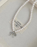 Pearl Bow Tassel Clavicle Necklace