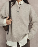 Cashmere Henley sweater for women with three-button neckline, dropped shoulders, long sleeves and ribbed cuffs and hem, a soft relaxed fall-winter knit for weekday layering.