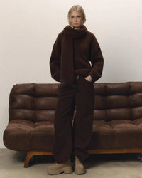 A Loose Soft V-Neck Sweater With A Scarf