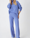 Half-turtleneck knit sweater and high waist wide-leg trouser 2-piece set. High-stretch acrylic knit, solid colour — loose, casual style for autumn and winter.