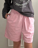 High-waist elastic waist casual shorts for women. Soft cotton-blend fabric, relaxed fit, and a versatile design perfect for summer lounging and everyday wear.