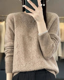Its wool construction feels comforting yet breathable, and the flexible knit maintains ease without losing structure. 