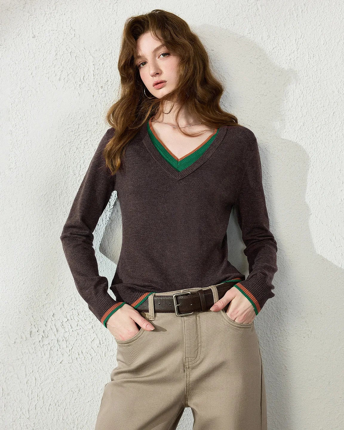 A slim-fit double-layer wool blend V-neck sweater with V-neckline, double-layer styling and high-stretch knit, designed for a smooth autumn layering look that pairs from sneakers to boots.