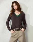 A slim-fit double-layer wool blend V-neck sweater with V-neckline, double-layer styling and high-stretch knit, designed for a smooth autumn layering look that pairs from sneakers to boots.