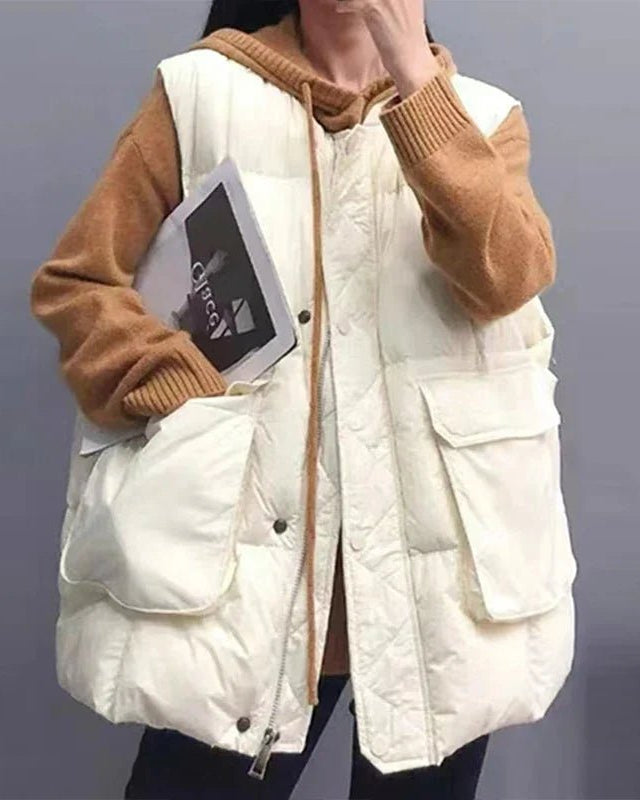 Women's casual round-neck vest down jacket featuring a full-front zipper and practical side pockets. This lightweight cotton-polyester puffer vest is an ideal layering piece for transitional weather in fall and spring.
