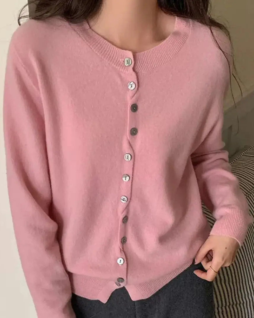 Wool knit pullover sweater — a clean O-neck women's knitwear piece in premium natural wool. Effortlessly versatile for autumn and winter layering.