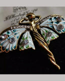Retro Art Nouveau elf brooch in antique bronze, whimsical fairy pin with flowing hair and ornate details, perfect for vintage fantasy style.