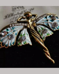 Retro Art Nouveau elf brooch in antique bronze, whimsical fairy pin with flowing hair and ornate details, perfect for vintage fantasy style.