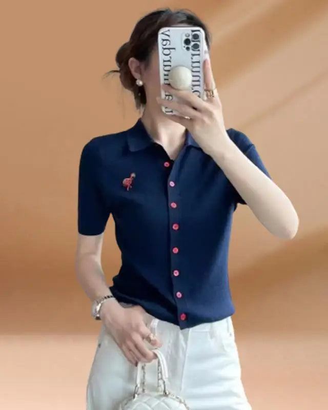 Polo collar slim-fit knit top — a lightweight, single-button short sleeve style designed for effortless commuter-to-casual warm-weather dressing.