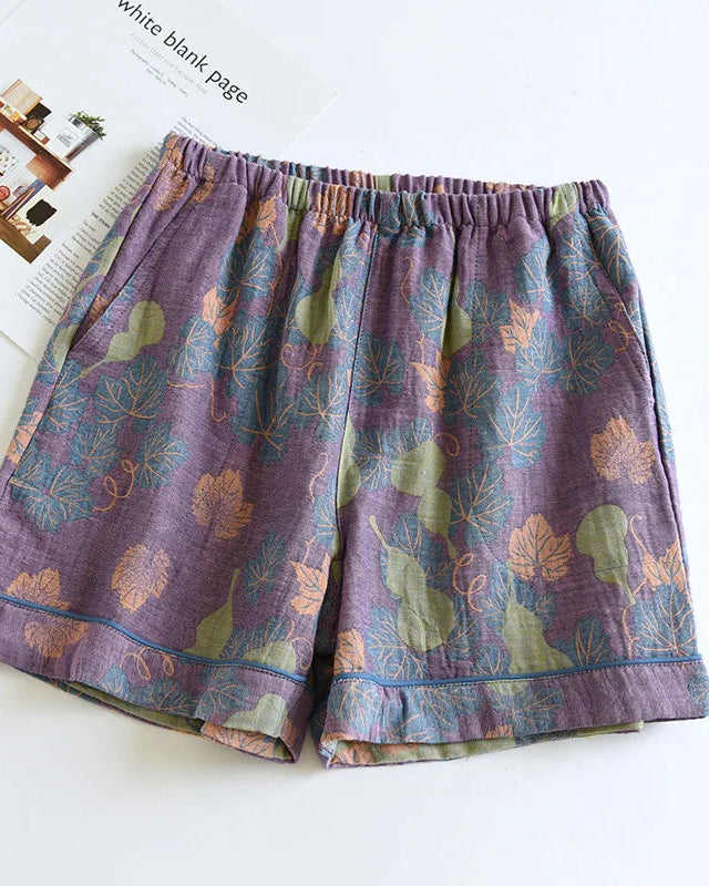 Women's Cotton printed lounge shorts featuring a sculpted elastic waistband and side pockets, crafted for breathable comfort with a relaxed straight leg silhouette that moves seamlessly from dawn lounging to dusk unwinding.