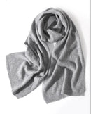 Diamond openwork creates a graceful surface, while the generous scarf shape makes layering feel natural. 