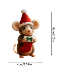 This felt mouse ornament pairs a tactile surface with an expressive face and charming seasonal attire.