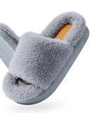 A pair of furry platform house slippers featuring a thick, soft upper and a lightweight EVA sole, designed for cozy comfort and a modern, elevated look.
