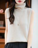100% merino wool sleeveless turtleneck sweater vest. Buttery soft, anti-pilling & breathable — effortless layering for women all season.
