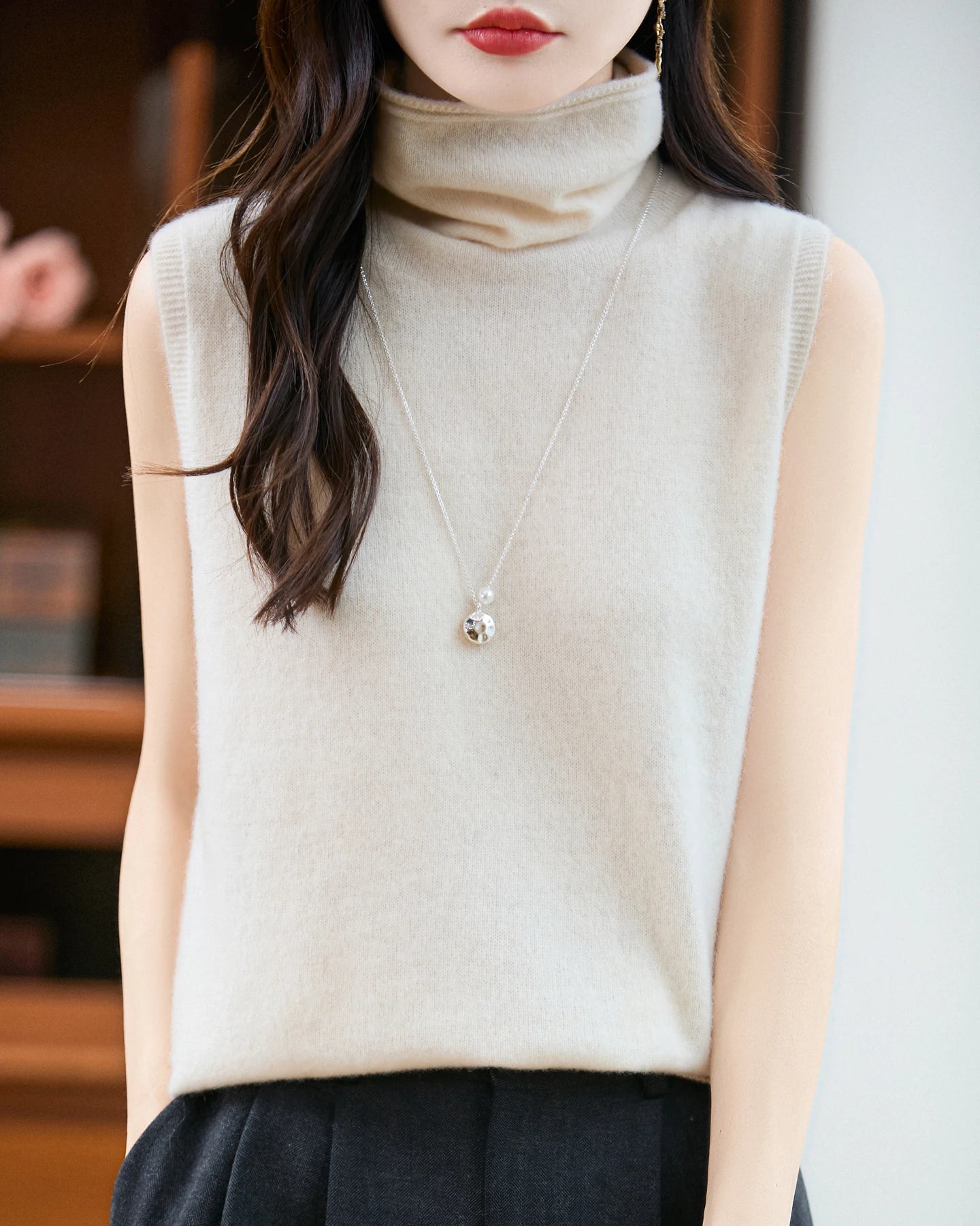 100% merino wool sleeveless turtleneck sweater vest. Buttery soft, anti-pilling & breathable — effortless layering for women all season.