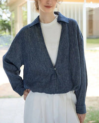 Linen Deep V-Neck Shirt Paired With A White Vest