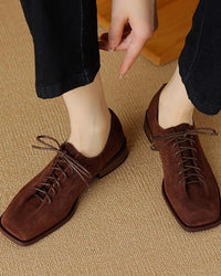 Women’s genuine leather lace-up block heels in black, oxford style shoes with square heel and stitching detail, perfect for casual everyday wear.