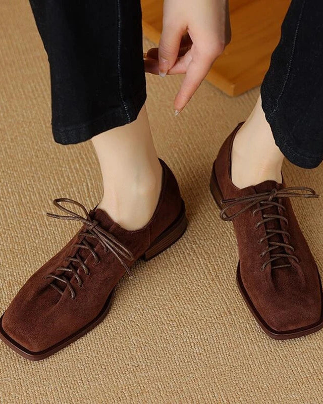 Women’s genuine leather lace-up block heels in black, oxford style shoes with square heel and stitching detail, perfect for casual everyday wear.