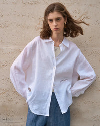 100% linen women’s shirt with embroidery detail, turndown collar and full-button placket. Loose mid-length silhouette — lightweight, breathable spring-summer casual wear.