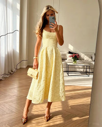 V-neck sleeveless backless jacquard A-line midi dress in polyester. Slight stretch, elegant silhouette — a chic summer party and evening gown for women.