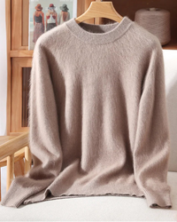 A mink cashmere crewneck sweater with crewneck, regular fit, long sleeves and stretch, designed for a cozy winter layering look that pairs from sneakers to boots.