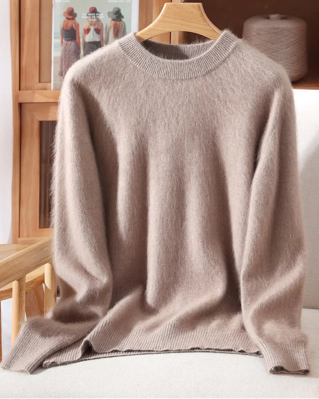 A mink cashmere crewneck sweater with crewneck, regular fit, long sleeves and stretch, designed for a cozy winter layering look that pairs from sneakers to boots.