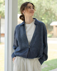 Linen Deep V-Neck Shirt Paired With A White Vest