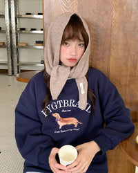 Women's wool triangle scarf featuring a breathable lightweight knit and durable stitched edges, designed for versatile wrapping as a shoulder drape or headwrap.