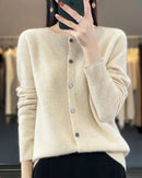 Wool O-neck seamless single-breasted open cardigan sweater. Heavyweight, medium stretch — a thick, elegant autumn winter knitwear top for women.