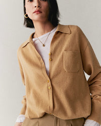 Women's cashmere blend loose-fit mid-length cardigan, featuring a fine yarn knit and turn-down collar for relaxed English-inspired elegance all season.