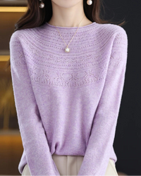 Women's Merino wool hollow-knit pullover featuring a seamless silhouette and delicate texture, crafted from pure Australian wool for breathable warmth and elegant layering in air-conditioned indoor settings.