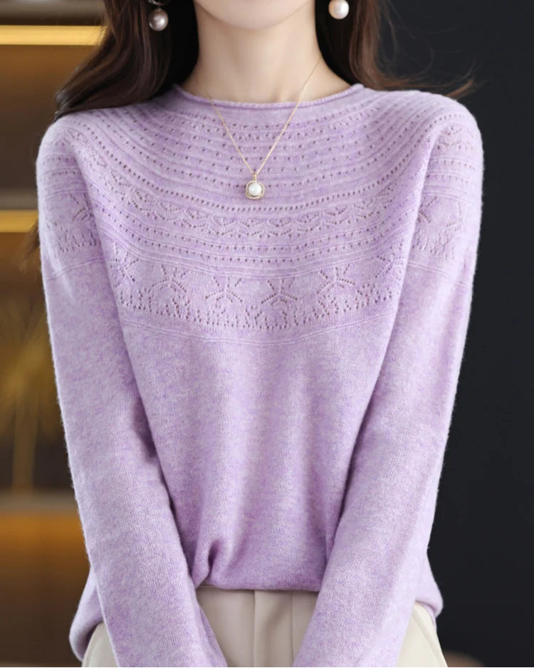 Women's Merino wool hollow-knit pullover featuring a seamless silhouette and delicate texture, crafted from pure Australian wool for breathable warmth and elegant layering in air-conditioned indoor settings.