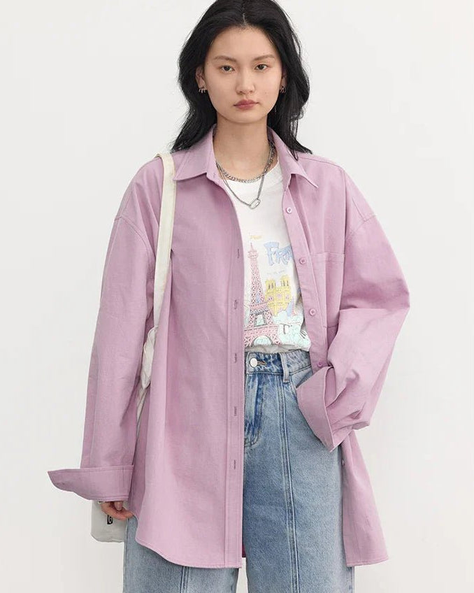 Oversized long-sleeved cotton shirt in pink, featuring a turn-down collar and breathable 21 cotton yarns fabric for a minimalist commuter look, perfect for layering.