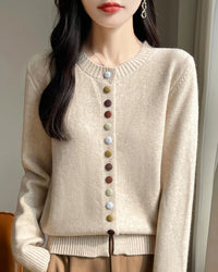 The knitted construction offers an even knit and gentle stretch, while the round neckline and full length sleeves keep the profile timeless.
