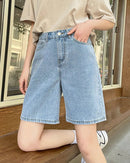 High-waist loose denim shorts for women. Relaxed straight-leg fit, breathable cotton-blend fabric.