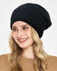 Satin-lined cashmere beanie with wide ribbed turn-up cuff, relaxed slouchy crown and smooth satin interior, a warm solid fall-winter knit hat for commuting or weekend walks.