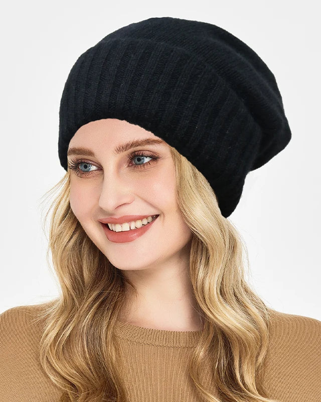Satin-lined cashmere beanie with wide ribbed turn-up cuff, relaxed slouchy crown and smooth satin interior, a warm solid fall-winter knit hat for commuting or weekend walks.