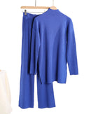 Half-turtleneck knit sweater and high waist wide-leg trouser 2-piece set. High-stretch acrylic knit, solid colour — loose, casual style for autumn and winter.