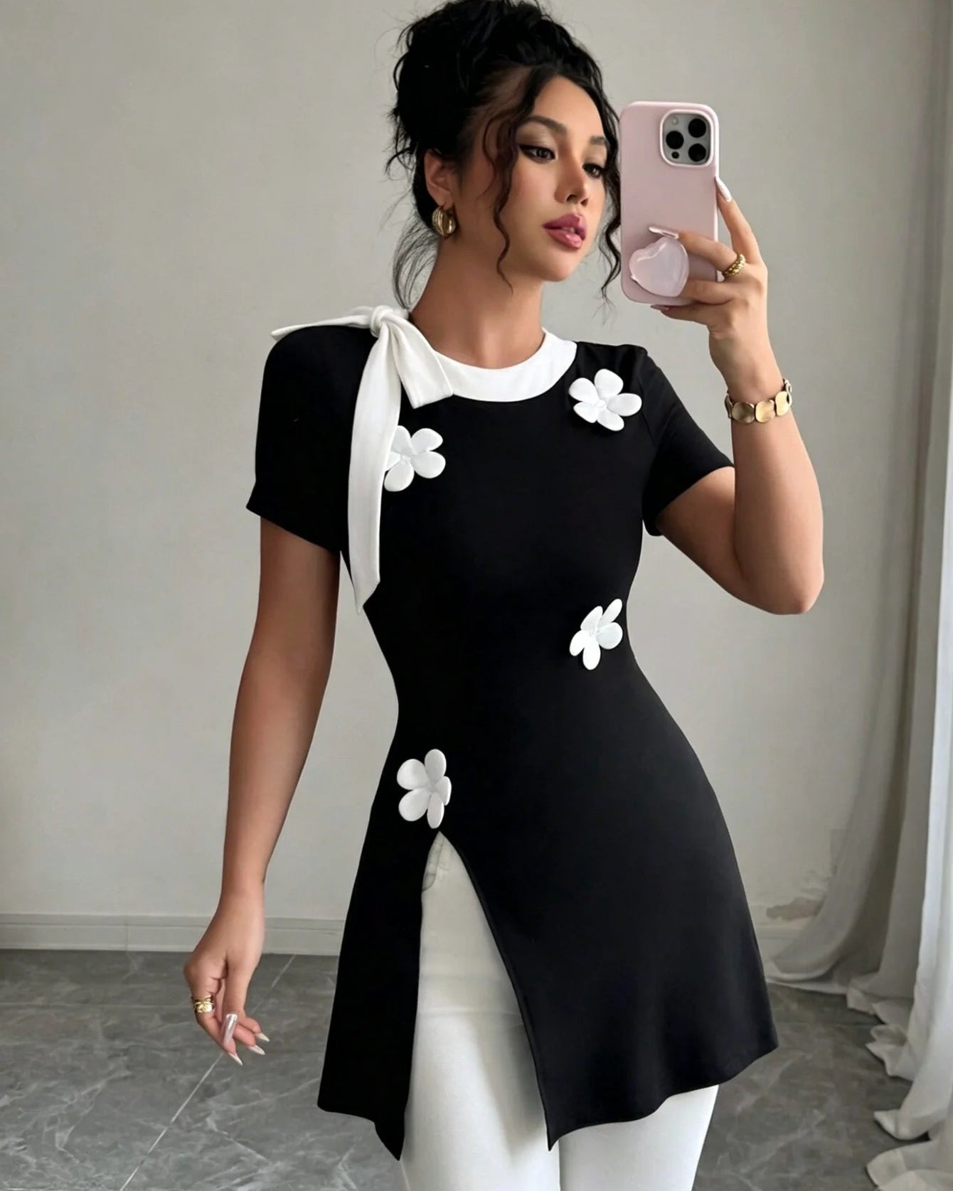 Bow tie V-neck tunic top. Soft stretch knit, flattering A-line silhouette, and elegant bow collar detail — perfect for office, casual, or evening wear.