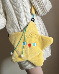 A star-shaped faux fur crossbody bag with cartoon detail, zipper and single strap, designed for a playful everyday look that transitions to party styling.