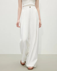 Women's Linen blend high-waist wide-leg pants featuring a full-length drape and slight stretch, crafted for breathable comfort and vintage elegance from boardroom meetings to weekend brunch in warm climates.