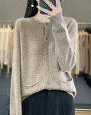 A cotton blend knit offers a gently textured hand, complemented by long sleeves and a regular fit that feels easy to wear.
