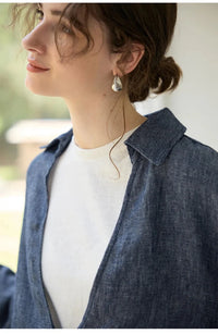 Linen Deep V-Neck Shirt Paired With A White Vest