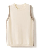 A sleeveless cashmere knit vest featuring a round neck, contrast side patchwork detail, and a relaxed A-line fit for a soft, breathable layer.